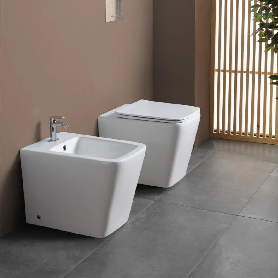 Bidé monomando de pie en cerámica blanca con un elegante diseño moderno - Giunco Viadurini