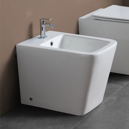 Bidé monomando de pie en cerámica blanca con un elegante diseño moderno - Giunco Viadurini