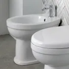 Bidé monomando de pie en cerámica blanca con un elegante diseño moderno - Sílice Viadurini