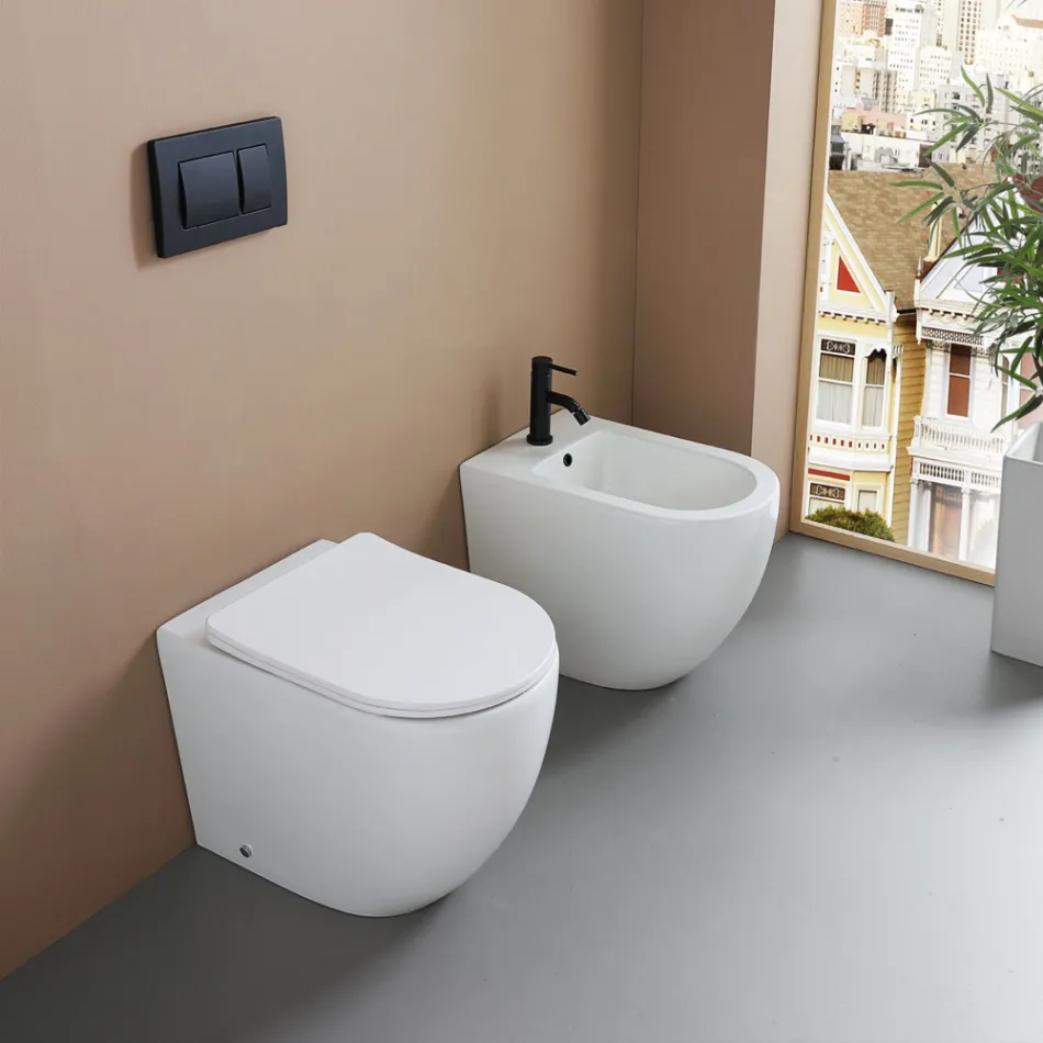 Bidé monomando de pie en cerámica blanca resistente con un diseño moderno - Olmo Viadurini
