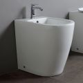 Bidé monoorificio con desagüe desplazado en cerámica de diseño moderno - Oleandro 