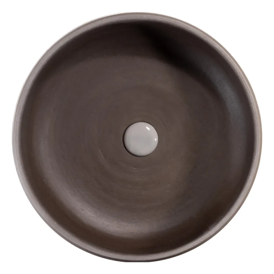 Composición de baño gris con espejo redondo y varios accesorios - Maryse Viadurini