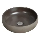 Composición de baño gris con espejo redondo y varios accesorios - Maryse Viadurini