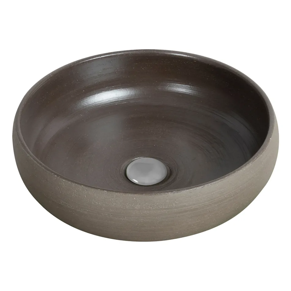 Composición de baño gris con espejo redondo y varios accesorios - Maryse Viadurini