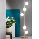 Lámpara de pie moderna en metal negro o dorado y vidrio soplado - Birga Viadurini