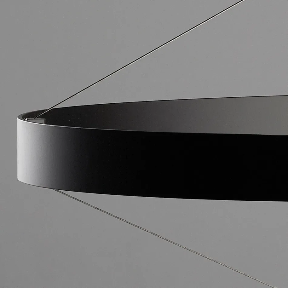 Lámpara de araña con cuerpo de cristal y 6 círculos de aluminio - Clara Viadurini