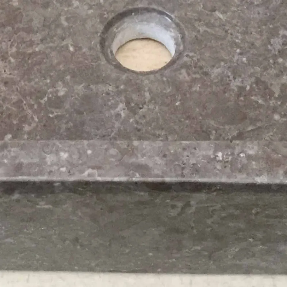 Lavabo de diseño de una pieza Jeff en piedra natural Viadurini