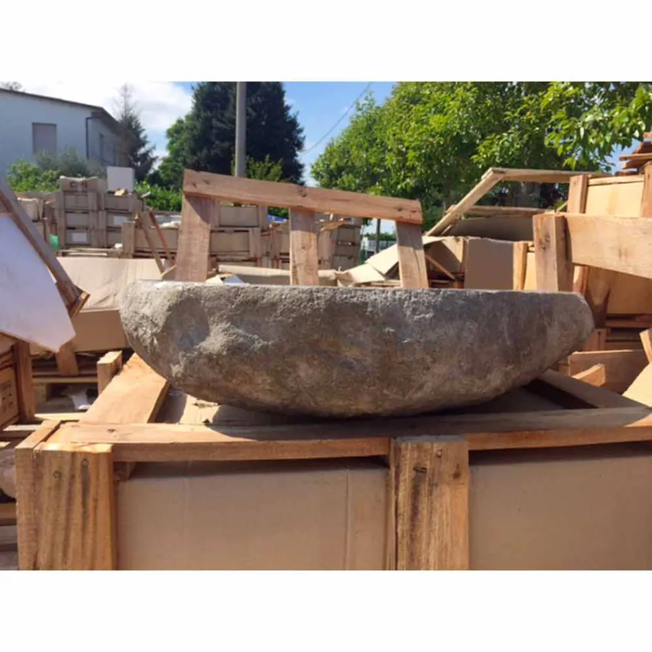 Lavabo sobre encimera elaborado artesanalmente en piedra de río - Aurea Viadurini