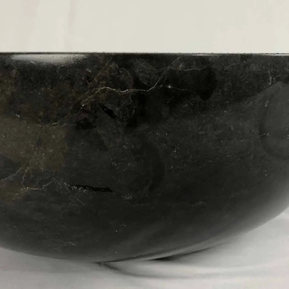 Lavabo sobre encimera redondo negro en piedra natural Levi, pieza única Viadurini