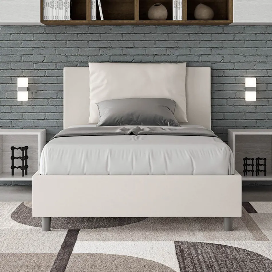 Cama de 120x200 cm con cabecero y cojines de piel sintética. Fabricada en Italia - Olimpiadi Viadurini