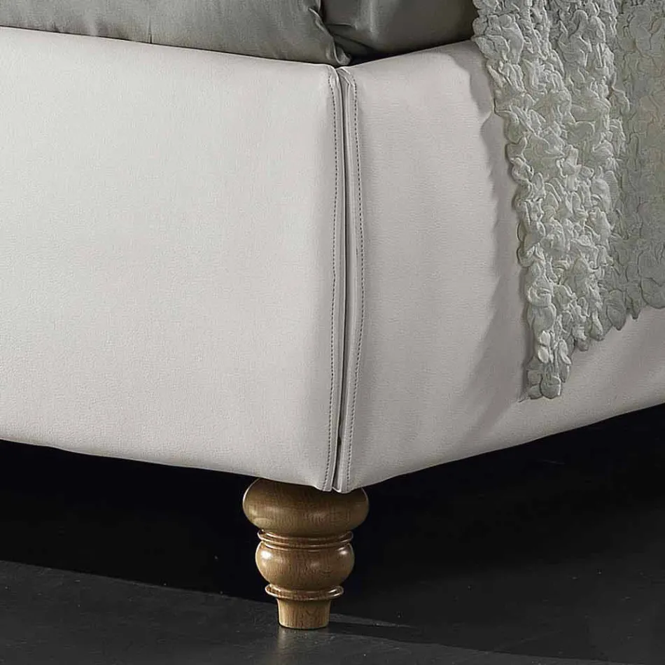 cama doble tapizada en piel sintética con caja de 160x190 / 200 cm Agly Viadurini