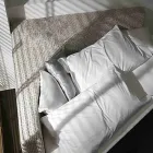 Cama doble redonda moderna con cabecera angular Made in Italy - Tima Viadurini