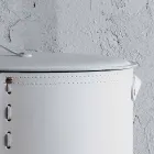 Lavadero ovalado en piel regenerada Riky fabricado en Italia. Viadurini