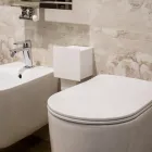 Portarrollos de baño en Corian blanco o con inserciones negras Diseño italiano - Elono Viadurini