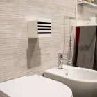 Portarrollos de baño en Corian blanco o con inserciones negras Diseño italiano - Elono Viadurini