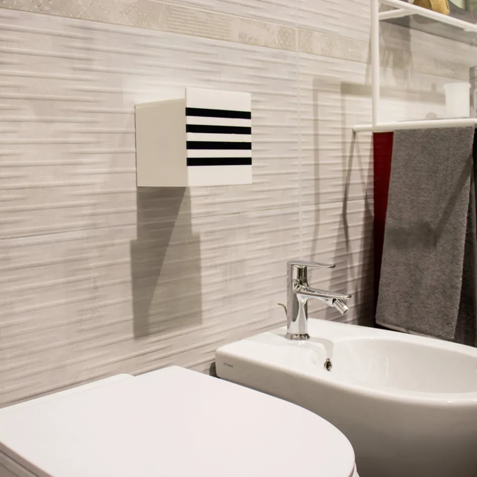 Portarrollos de baño en Corian blanco o con inserciones negras Diseño italiano - Elono Viadurini