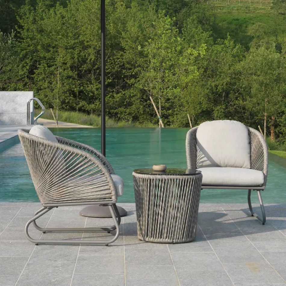 Salón compuesto por 2 sillones con mesa de centro - Maleta Viadurini