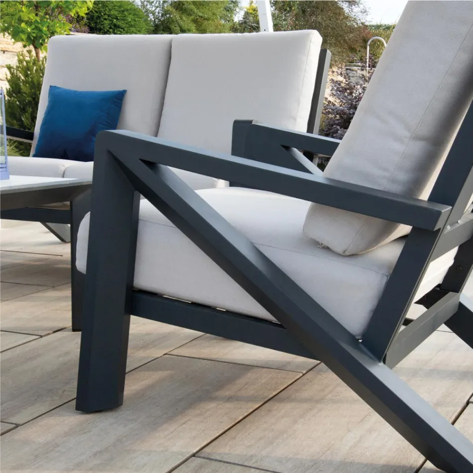 Salón compuesto por sofá, mesa de centro y sillones con reposapiés - Tablón de anuncios Viadurini