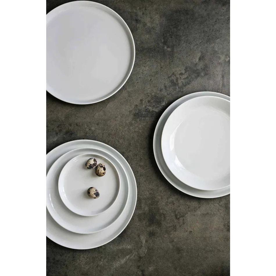Plato llano de porcelana de diseño moderno blanco, 24 piezas - Ártico Viadurini