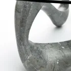 Mesa de centro con tapa de cristal y base de piedra fósil - California Viadurini