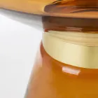 Mesa de centro en vidrio y decoración en acero bañado en latón - Gabrio Viadurini