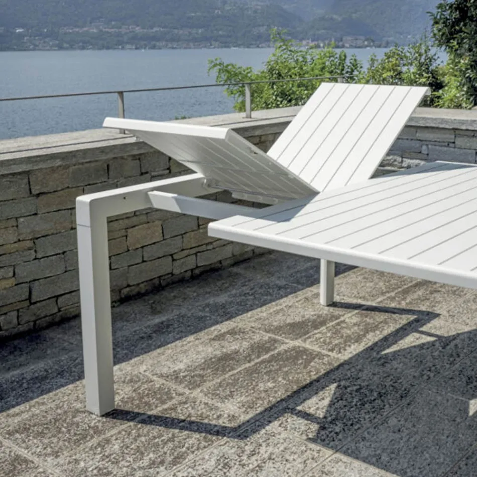 Mesa extensible con patas correderas y tablero de lamas de aluminio - Supernova Viadurini