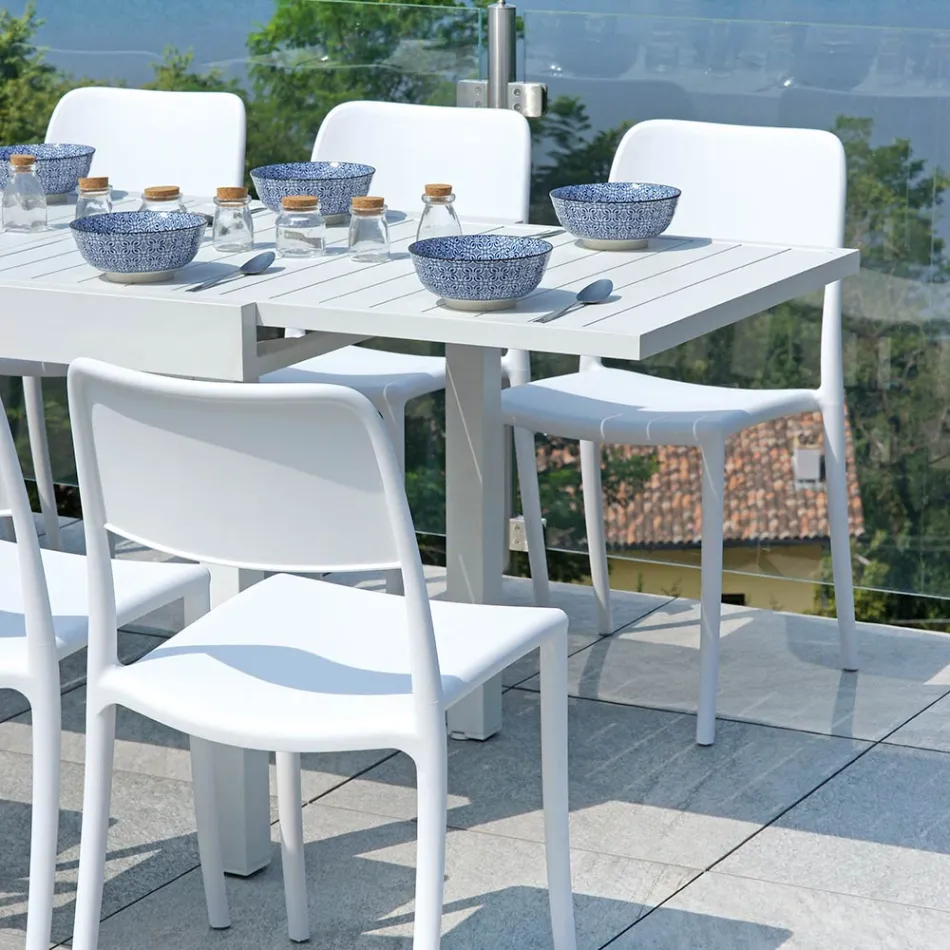 Mesa extensible de exterior con tablero de lamas de aluminio - Supernova Viadurini