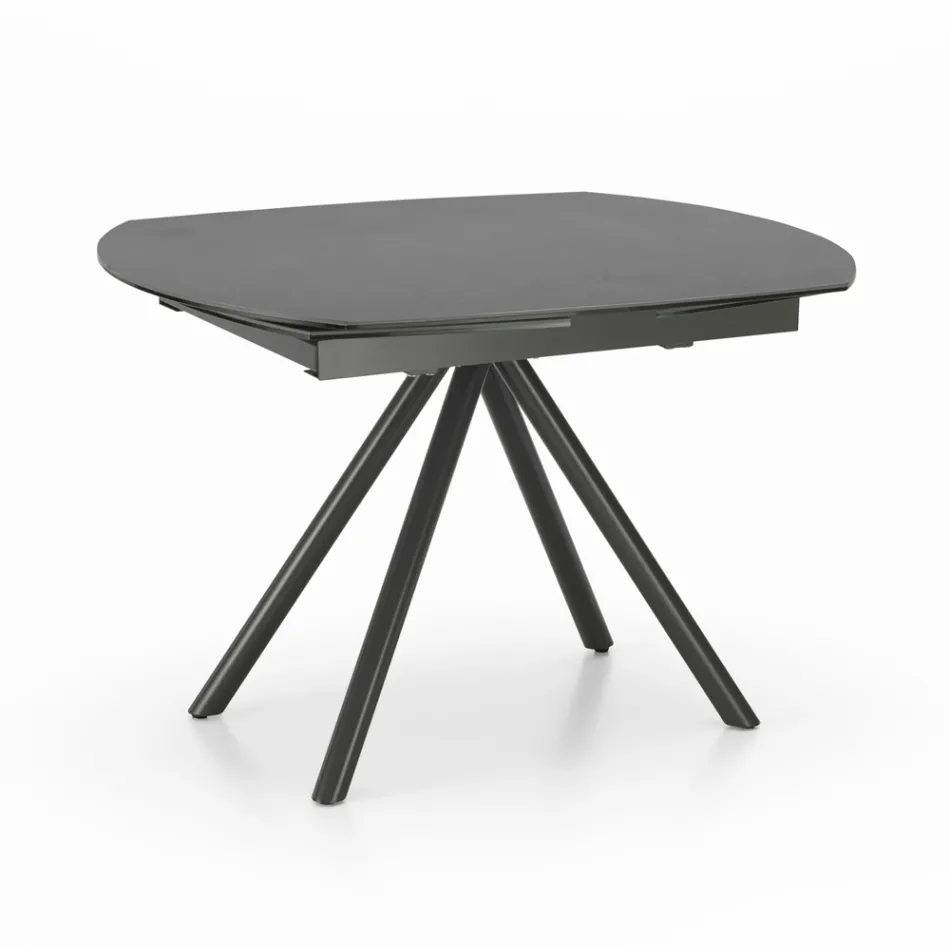 Mesa extensible hasta 180 cm en cerámica sobre vidrio y metal - Lozzolo Viadurini
