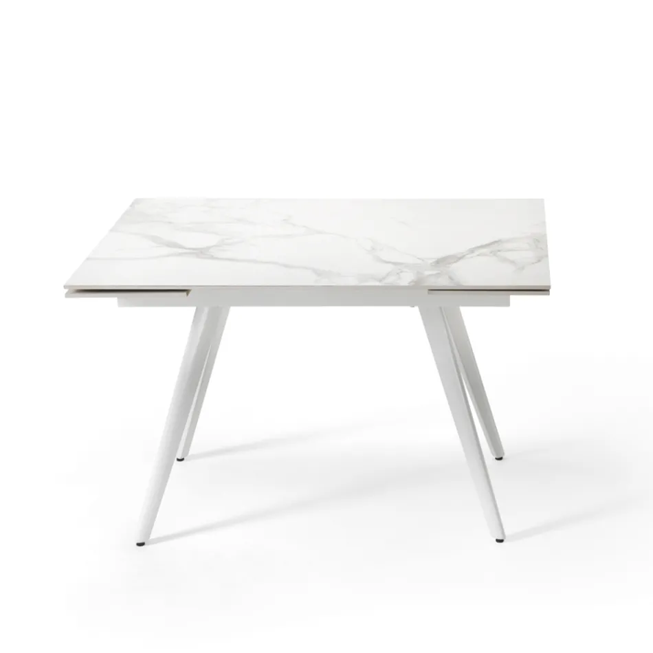 Mesa extensible de hasta 180 cm en piedra efecto mármol y metal - Numa Viadurini