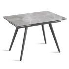 Mesa extensible de hasta 180 cm en piedra efecto mármol y metal - Numa Viadurini
