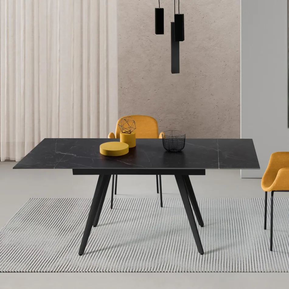 Mesa extensible de hasta 180 cm en piedra efecto mármol y metal - Numa Viadurini