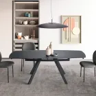 Mesa extensible de hasta 210 cm en cristal y metal pintado - Naxos Viadurini