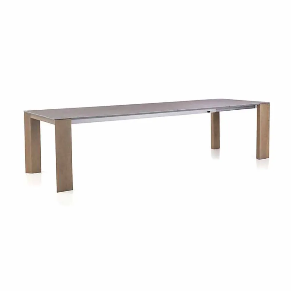 Mesa extensible hasta 300 cm en cerámica y patas de madera - Ipanemo Viadurini