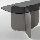 Mesa con tapa de cristal perfilado y base de metal curvada - Piacere Viadurini