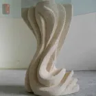 mesa redonda de piedra con tapa de cristal Cadmo Viadurini