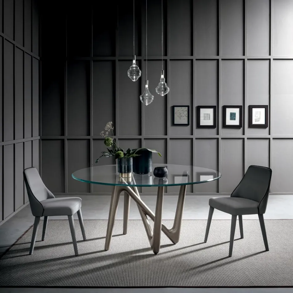 Mesa de comedor redonda en vidrio transparente y patas de poliuretano - Stalto Viadurini