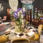 modeno Mesa redonda con tapa de cristal y incrustaciones Ozzy wood Viadurini