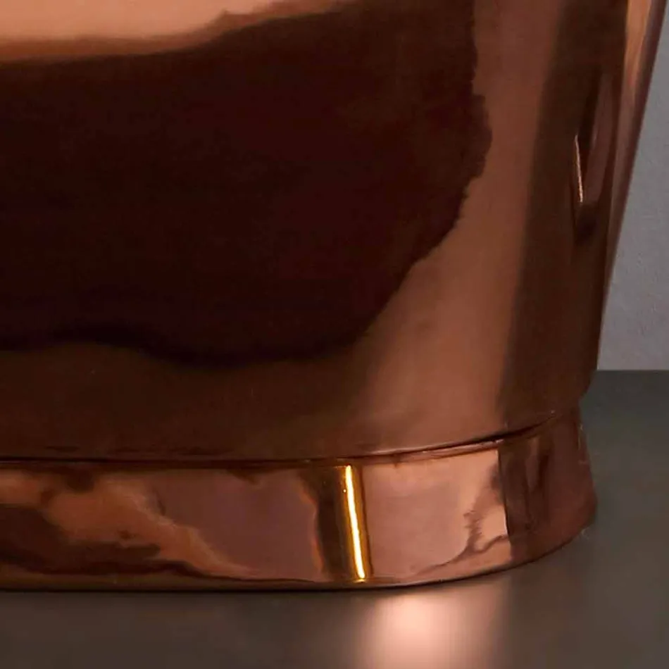 diseño baño independiente níquel y cobre Angelica Viadurini