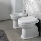 Inodoro moderno de cerámica blanca de pie con asiento de poliéster - Sílice Viadurini